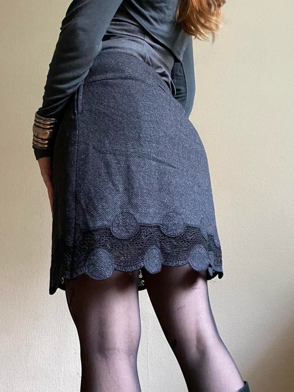 Wool mini mod skirt with a creative lace and circle shape appliqué hemline